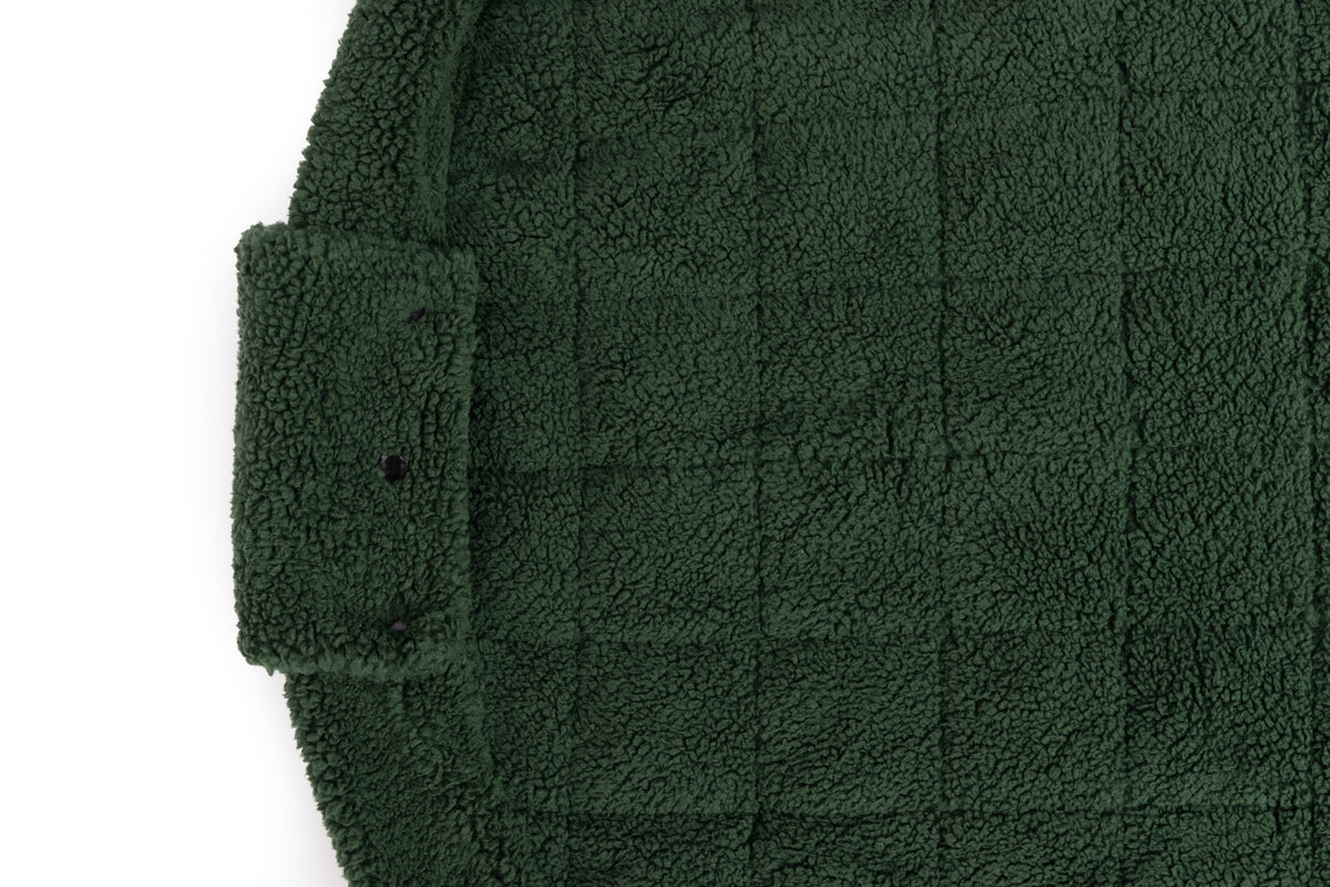 2-in-1 babyspeelkleed & reistas – teddy evergreen